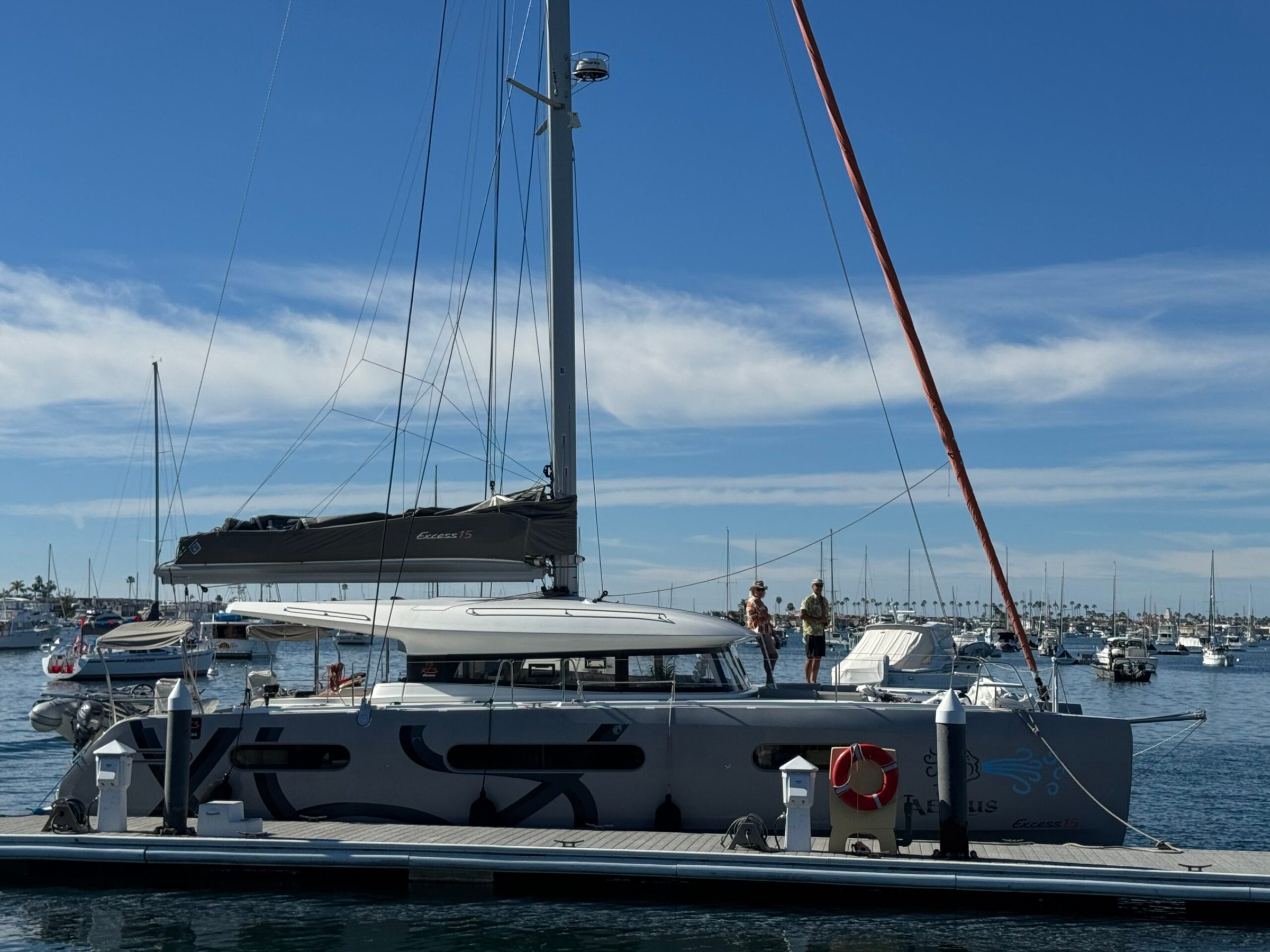 a boat is docked next to a body of water