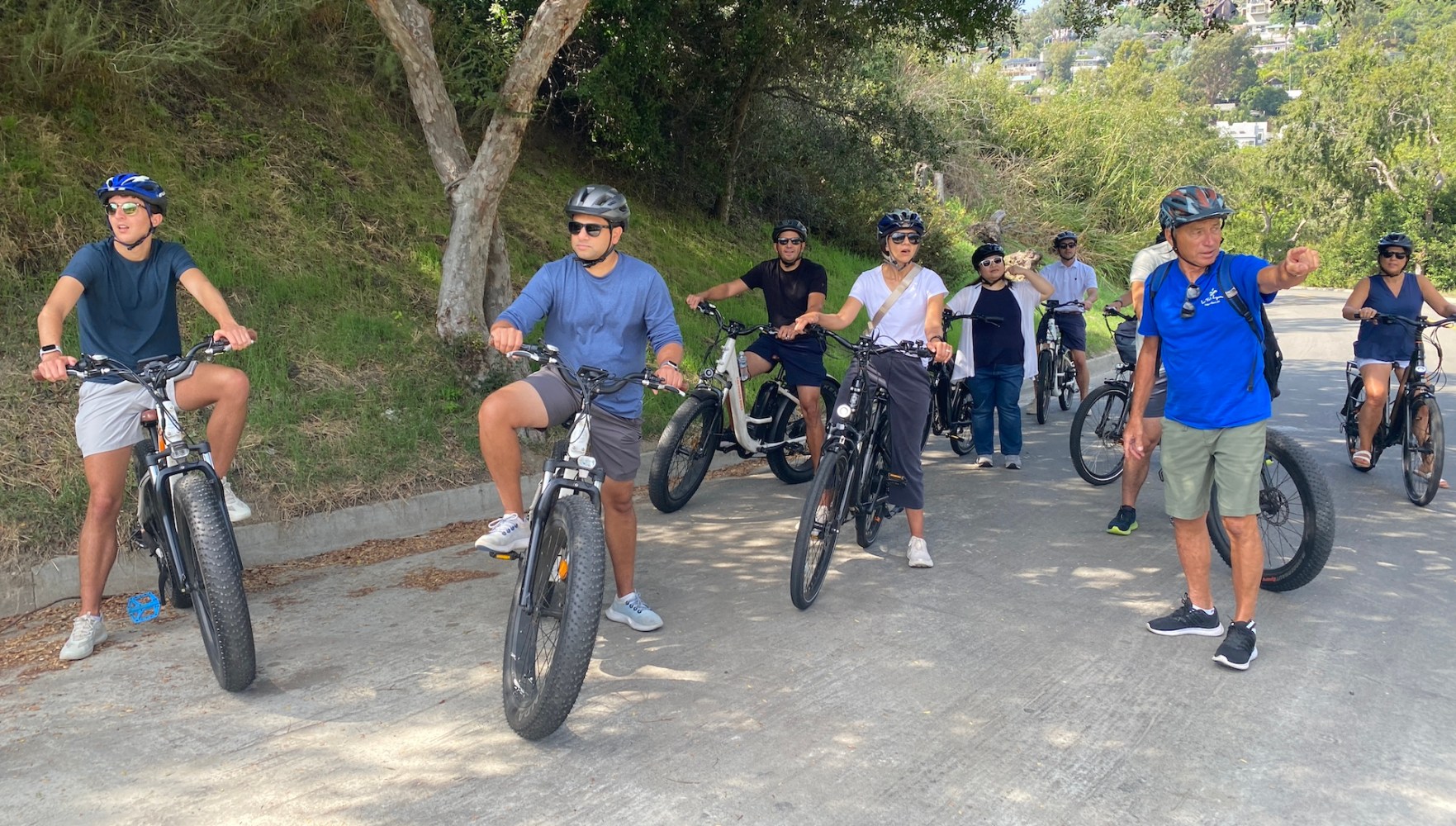 a group of people riding on a bike tour